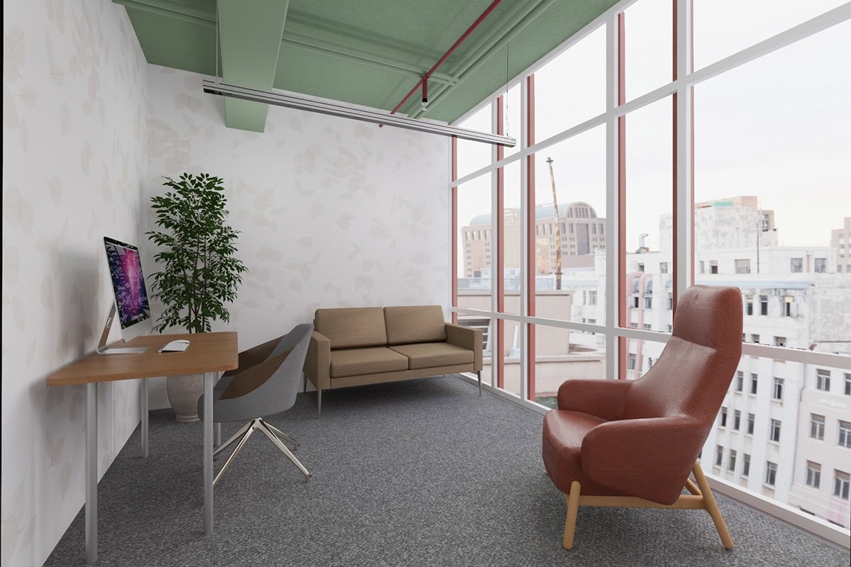 An individual therapy room with floor to ceiling windows, letting lots of light in.