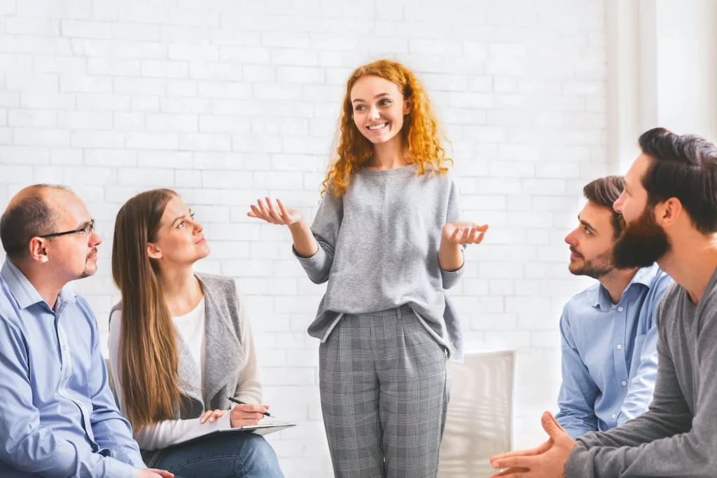 People participate in therapy at an Adderall addiction treatment center.