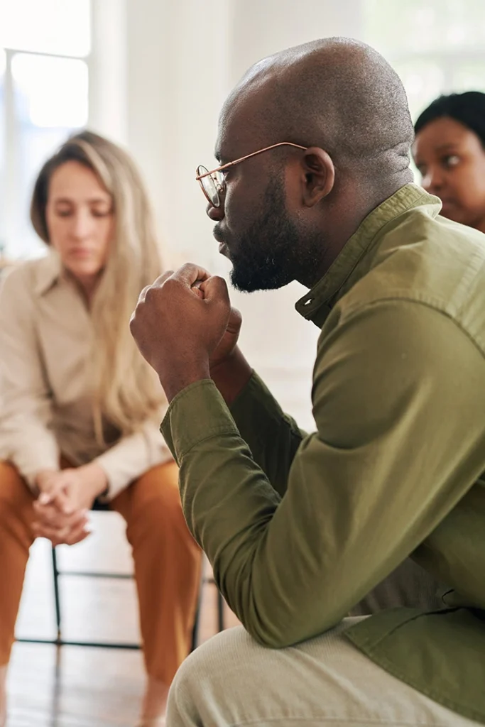 People participate in therapy at a borderline personality disorder treatment center.